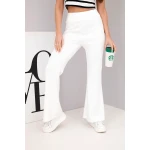 Spodnie damskie masełko z rozszerzaną nogawką ecru-1