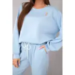 Komplet damski masełko bluza z broszką i spodnie z prostą nogawką niebieski-2