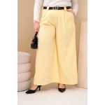 Spodnie damskie Plus Size wiskozowe z szeroką nogawką i paskiem żółte-1
